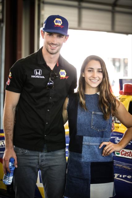 Alexander Ross and Olympic gold metalist Aly Raisman in the Andretti Autosport garages at Sonoma Raceway -- Photo by: Shawn Gritzmacher