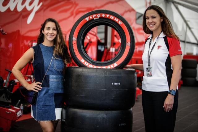 Olympic gymnast Aly Raisman and Chief Engineer Cara Adams in the Firestone garages at Sonoma Raceway -- Photo by: Shawn Gritzmacher