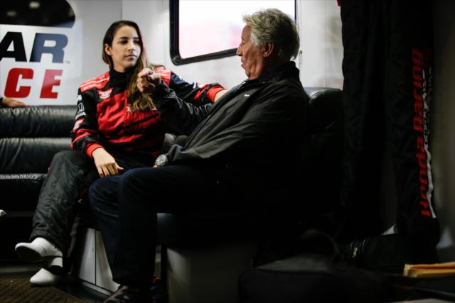 Olympic gymnast Aly Raisman chats with Indy car legend Mario Andretti prior to their two-seater ride at Sonoma Raceway -- Photo by: Shawn Gritzmacher