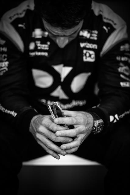 Simon Pagenaud with a quiet moment backstage during pre-race introductions for the GoPro Grand Prix of Sonoma at Sonoma Raceway -- Photo by: Shawn Gritzmacher