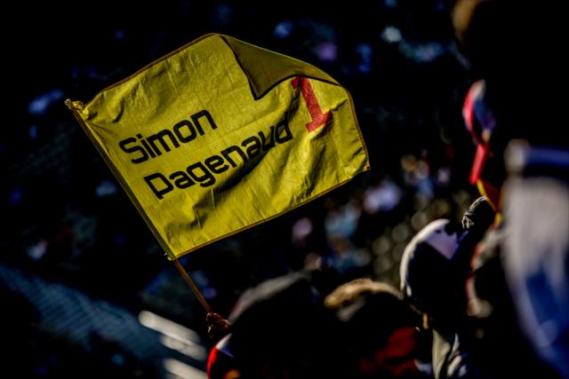Fans fly the flag of Simon Pagenaud during pre-race introductions for the GoPro Grand Prix of Sonoma at Sonoma Raceway -- Photo by: Shawn Gritzmacher
