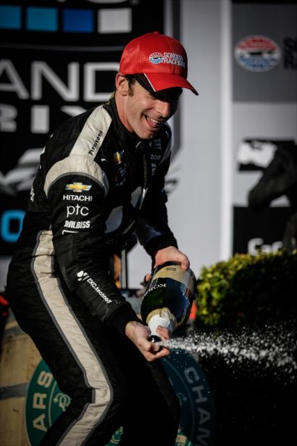 Simon Pagenaud sprays the champagne in Victory Lane after winning the GoPro Grand Prix of Sonoma at Sonoma Raceway -- Photo by: Shawn Gritzmacher