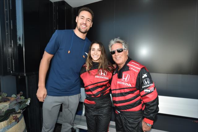 Klay Thompson, Aly Raisman, and Mario Andretti backstage during pre-race festivities for the GoPro Grand Prix of Sonoma at Sonoma Raceway -- Photo by: Chris Owens
