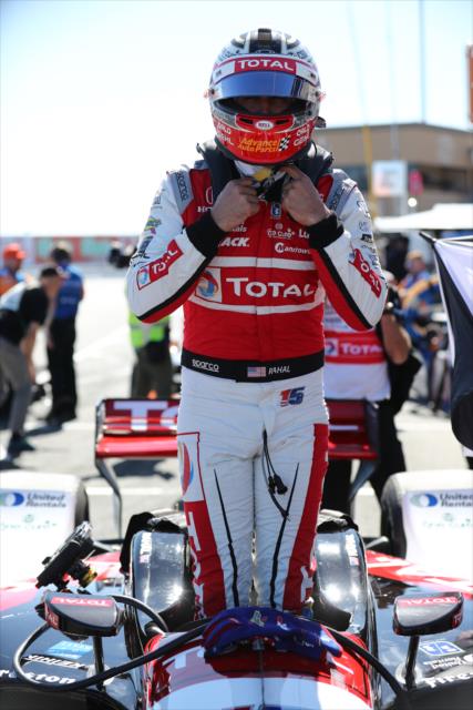Graham Rahal adjusts his HANS Device on pit lane prior to practice for the INDYCAR Grand Prix of Sonoma at Sonoma Raceway -- Photo by: Chris Jones