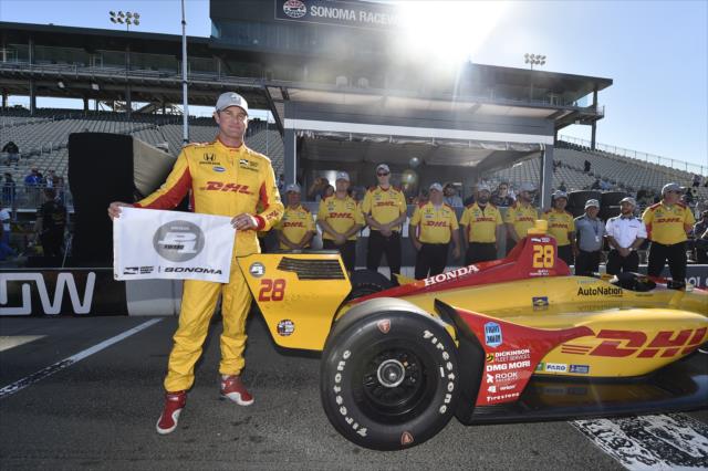 Ryan Hunter-Reay with the Verizon P1 Award flag on pit lane after winning the pole position for the INDYCAR Grand Prix of Sonoma at Sonoma Raceway -- Photo by: Chris Owens