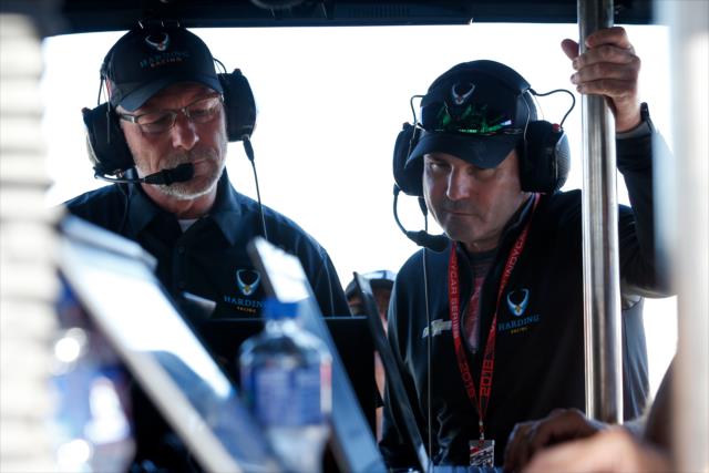 Team owner Mike Harding looks over data in the Harding Racing pit stand during qualifications for the INDYCAR Grand Prix of Sonoma at Sonoma Raceway -- Photo by: Joe Skibinski