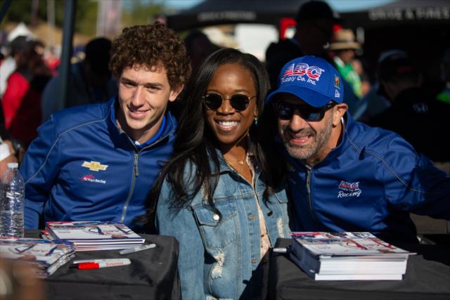 Teammates Matheus 'Matt' Leist and Tony Kanaan pose for a photograph during the autograph session in the INDYCAR Fan Village at Sonoma Raceway -- Photo by: Stephen King