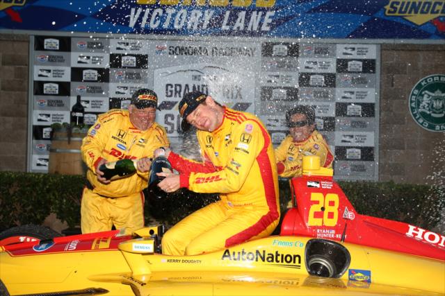 Ryan Hunter-Reay with a champagne spray in Victory Lane after winning the Grand Prix of Sonoma at Sonoma Raceway -- Photo by: Chris Jones