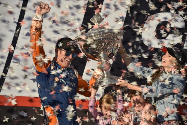 Scott Dixon with his family and the Astor Cup on stage after winning the 2018 Verizon IndyCar Series championship at Sonoma Raceway -- Photo by: Chris Owens