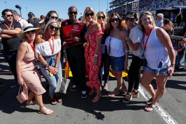 MC Hammer with Beccy Hunter-Reay and several friends on pit lane during pre-race festivities for the INDYCAR Grand Prix of Sonoma at Sonoma Raceway -- Photo by: Joe Skibinski