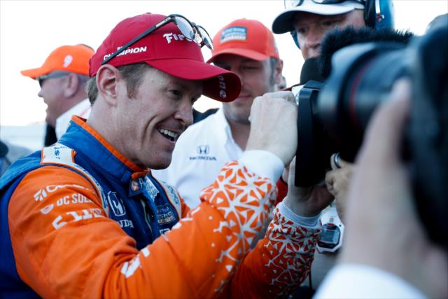 Scott Dixon signs the television camera on pit lane after winning the 2018 Verizon IndyCar Series championship at Sonoma Raceway -- Photo by: Joe Skibinski