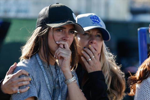 Alexander Rossi's girlfriend, Kelly, and his personal assistant, Liza, with worried looks during the start of the INDYCAR Grand Prix of Sonoma at Sonoma Raceway -- Photo by: Joe Skibinski