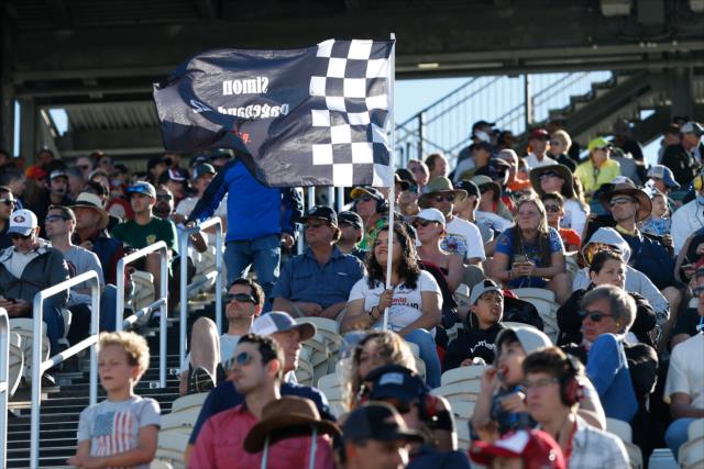 A fan of Simon Pagenaud flies a supportive flag during the INDYCAR Grand Prix of Sonoma at Sonoma Raceway -- Photo by: Joe Skibinski