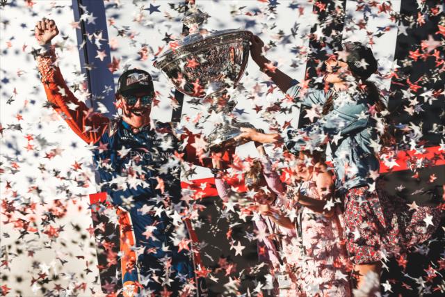 Scott Dixon and his family with the Astor Cup on stage after winning the 2018 Verizon IndyCar Series championship at Sonoma Raceway -- Photo by: Joe Skibinski