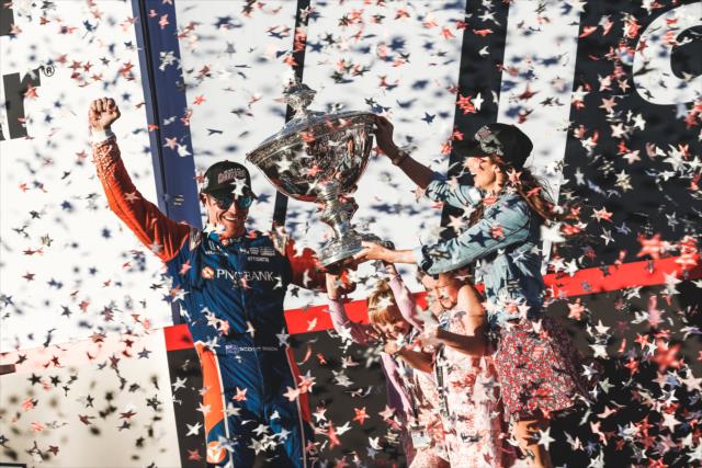 Scott Dixon with his family and the Astor Cup on stage after winning the 2018 Verizon IndyCar Series championship at Sonoma Raceway -- Photo by: Joe Skibinski