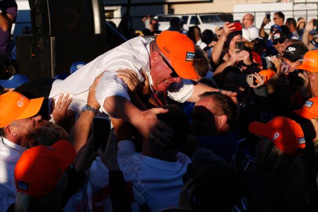 Team owner Chip Ganassi dives off stage for a little crowdsurfing after winning the 2018 Verizon IndyCar Series championship at Sonoma Raceway -- Photo by: Joe Skibinski