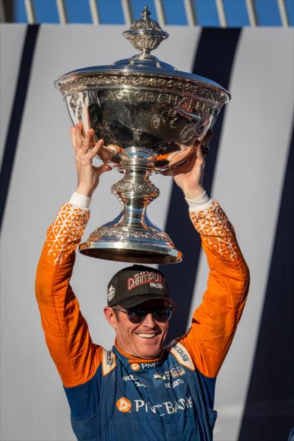 Scott Dixon hoists the Astor Cup on stage after winning the 2018 Verizon IndyCar Series championship at Sonoma Raceway -- Photo by: Stephen King