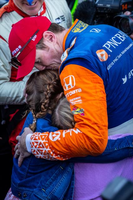 Scott Dixon receives a warm hug from his daughter on pit lane after winning the 2018 Verizon IndyCar Series championship at Sonoma Raceway -- Photo by: Stephen King