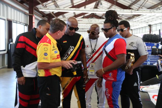 MC Hammer and his entourage are shown a modern-day Verizon IndyCar Series steering wheel in the Andretti Autosport garages at Sonoma Raceway -- Photo by: Shawn Gritzmacher