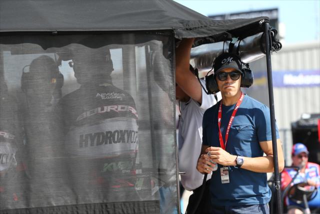 Former F1 driver Pastor Maldonado watches track activity during practice for the Iowa Corn 300 at Iowa Speedway -- Photo by: Chris Jones
