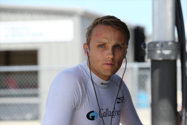 Max Chilton waits along pit lane prior to his qualification attempt for the Iowa Corn 300 at Iowa Speedway -- Photo by: Chris Jones
