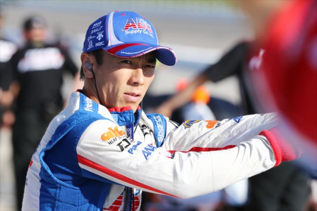Takuma Sato waits along pit lane prior to his qualification attempt for the Iowa Corn 300 at Iowa Speedway -- Photo by: Chris Jones