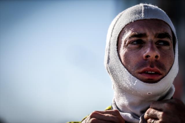 Simon Pagenaud adjusts his balaclava prior to the final practice for the Iowa Corn 300 at Iowa Speedway -- Photo by: Shawn Gritzmacher