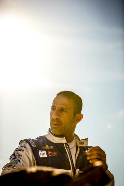 Tony Kanaan gets prepared along pit lane for the final practice for the Iowa Corn 300 at Iowa Speedway -- Photo by: Shawn Gritzmacher