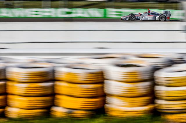 Will Power streaks down the backstretch during the final practice for the Iowa Corn 300 at Iowa Speedway -- Photo by: Shawn Gritzmacher