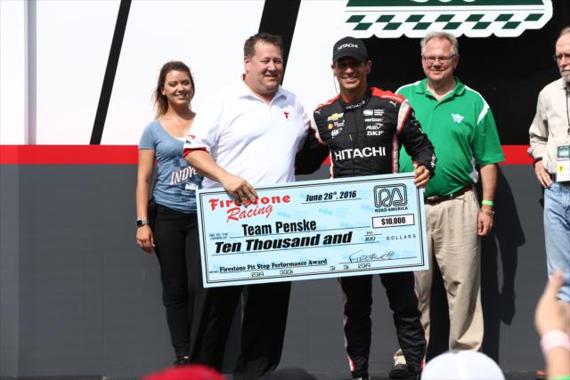 Helio Castroneves accepts the Firestone Pit Stop Performance award on behalf of Team Penske for their performance at Road America -- Photo by: Chris Jones
