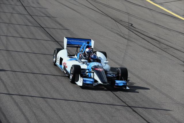 Gil de Ferran drives the Honda Fastest Seat in Sports two-seater prior to the start of the Iowa Corn 300 at Iowa Speedway -- Photo by: Chris Jones