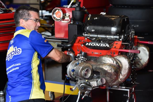 An Andretti Autosport engineer prepares the engine of Marco Andretti for the Iowa Corn 300 at Iowa Speedway -- Photo by: Chris Owens