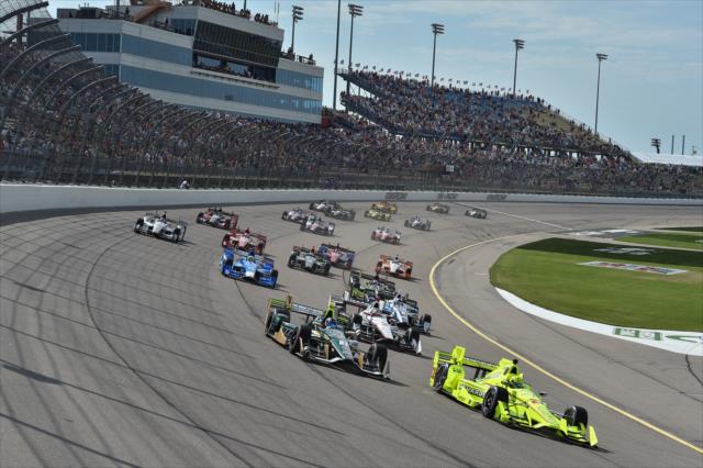 Simon Pagenaud and Josef Newgarden lead the field into Turn 1 during the Iowa Corn 300 at Iowa Speedway -- Photo by: Chris Owens
