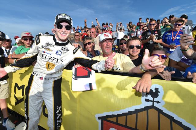 Josef Newgarden celebrates with fans in Victory Lane following his win in the Iowa Corn 300 at Iowa Speedway -- Photo by: Chris Owens