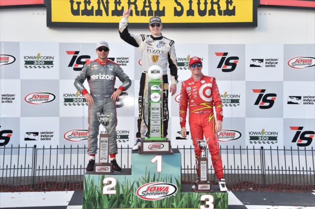The podium of Josef Newgarden, Will Power, and Scott Dixon with their trophies in Victory Lane following the Iowa Corn 300 at Iowa Speedway -- Photo by: Chris Owens