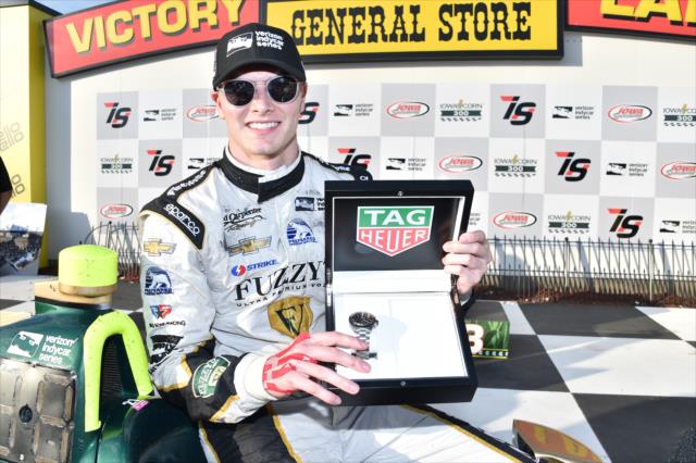 Josef Newgarden with his TAG Heuer winners watch after winning the Iowa Corn 300 at Iowa Speedway -- Photo by: Chris Owens