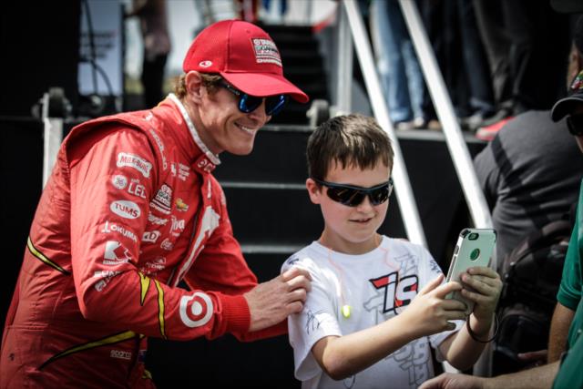 Scott Dixon poses for a photograph during pre-race festivities for the Iowa Corn 300 at Iowa Speedway -- Photo by: Shawn Gritzmacher