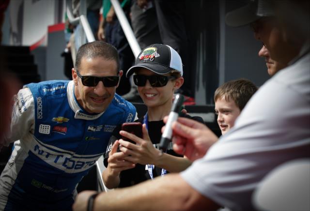 Tony Kanaan poses for a photograph during pre-race festivities for the Iowa Corn 300 at Iowa Speedway -- Photo by: Shawn Gritzmacher