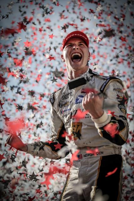 The confetti flies in Victory Lane as Josef Newgarden wins the Iowa Corn 300 at Iowa Speedway -- Photo by: Shawn Gritzmacher