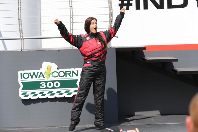 Gearhead Diva Rachel De Barros waives to the crowd prior to her 2-seater ride during pre-race festivities for the Iowa Corn 300 at Iowa Speedway -- Photo by: Chris Jones