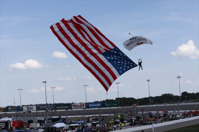 The U.S. Flag makes its entrance to Iowa Speedway during pre-race festivities for the Iowa Corn 300 -- Photo by: Chris Jones