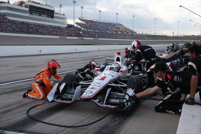 Helio Castroneves comes in for tires and fuel on pit lane during the Iowa Corn 300 at Iowa Speedway -- Photo by: Chris Jones