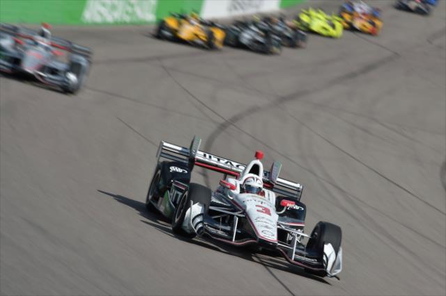 Helio Castroneves leads the field into Turn 3 during the Iowa Corn 300 at Iowa Speedway -- Photo by: Chris Owens