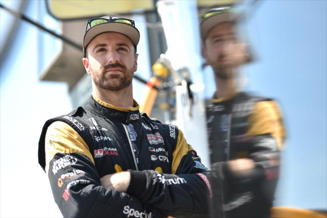 James Hinchcliffe looks down pit lane prior to the pit stop practice for the Iowa Corn 300 at Iowa Speedway -- Photo by: Chris Owens