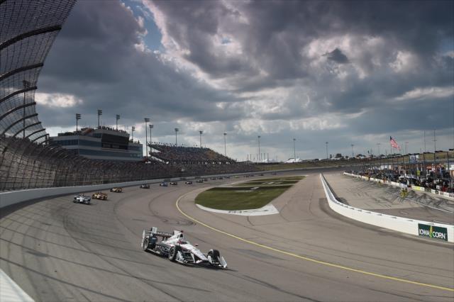Helio Castroneves leads the field into Turn 1 during the Iowa Corn 300 at Iowa Speedway -- Photo by: Chris Owens