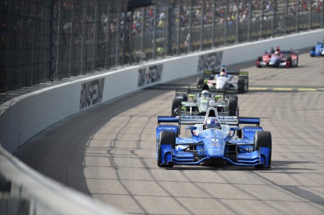 Scott Dixon leads a group down the frontstretch during the Iowa Corn 300 at Iowa Speedway -- Photo by: Chris Owens