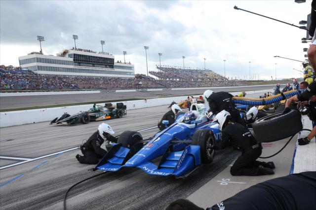 Scott Dixon comes in for tires and fuel on pit lane during the Iowa Corn 300 at Iowa Speedway -- Photo by: Joe Skibinski