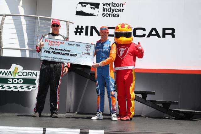 Scott Dixon accepts the Firestone Pit Stop Performance Award on behalf of Chip Ganassi Racing during pre-race festivities for the Iowa Corn 300 at Iowa Speedway -- Photo by: Chris Jones