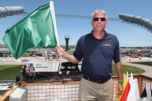 Iowa Corn Growers Association President Mark Recker ready to waive the green flag as honorary starter for the Iowa Corn 300 at Iowa Speedway -- Photo by: Chris Jones