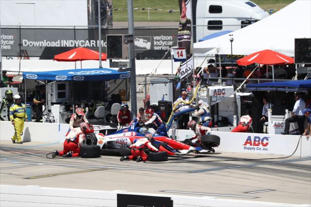 Tony Kanaan comes in for tires and fuel on pit lane during the Iowa Corn 300 at Iowa Speedway -- Photo by: Chris Jones